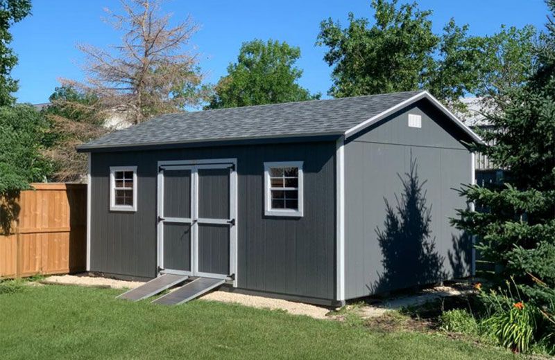 Dark gray garden shed with ramps