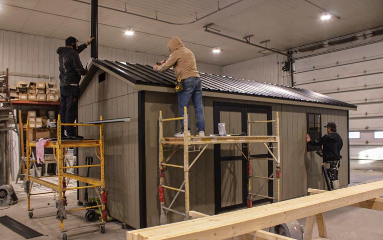 Shed builders at work in a workshop